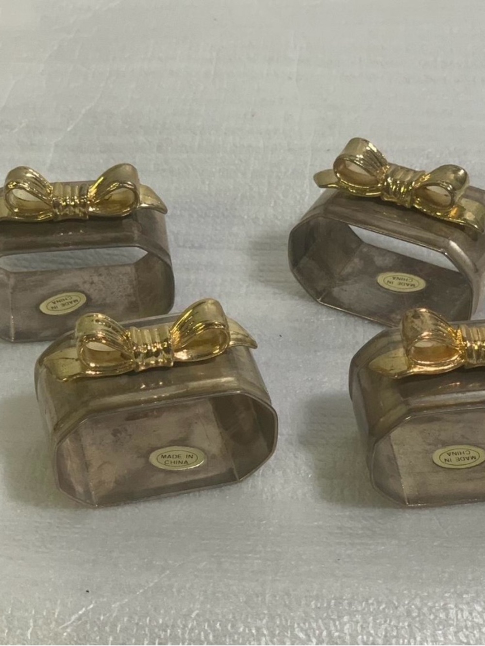 Set of 4 Vintage Silver Plated Oval Napkin Rings with Gold-Toned Bows